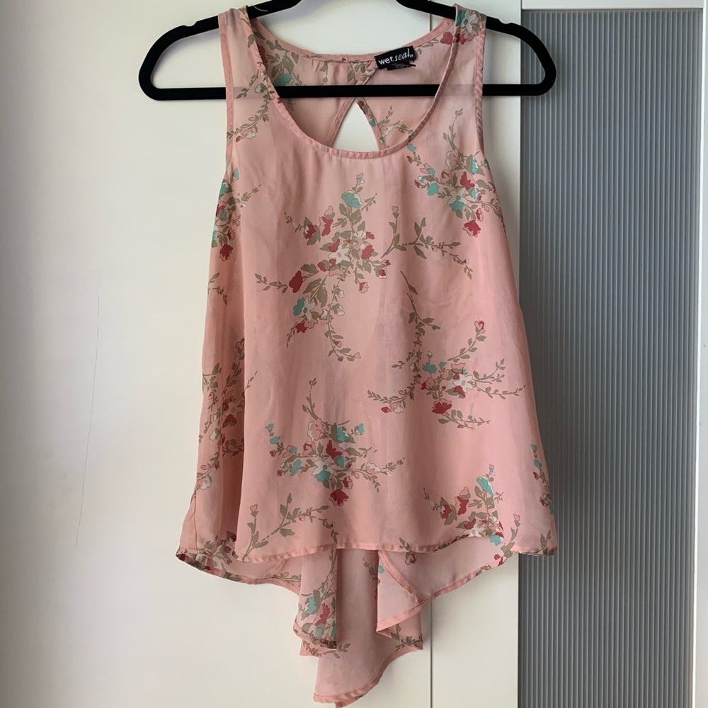 Pastel pink top with open back